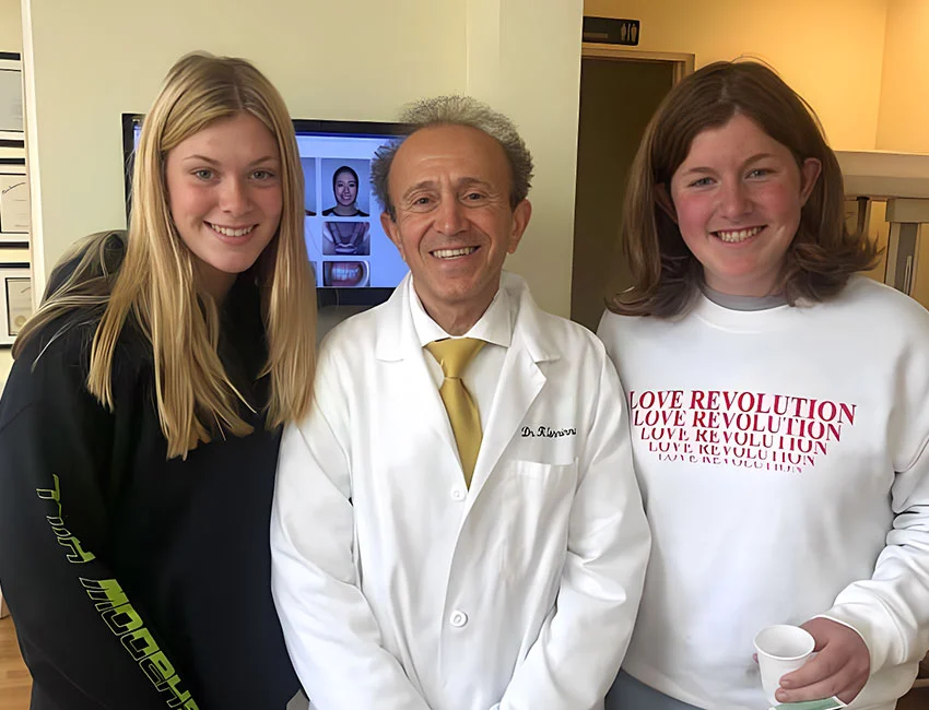 Dr. Kourosh Zarrinnia with orthodontic patients at Orthodontics in Woodland Hills
